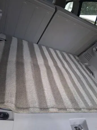 Blue Kia Stinger professional auto detailing with paint correction and ceramic coating services